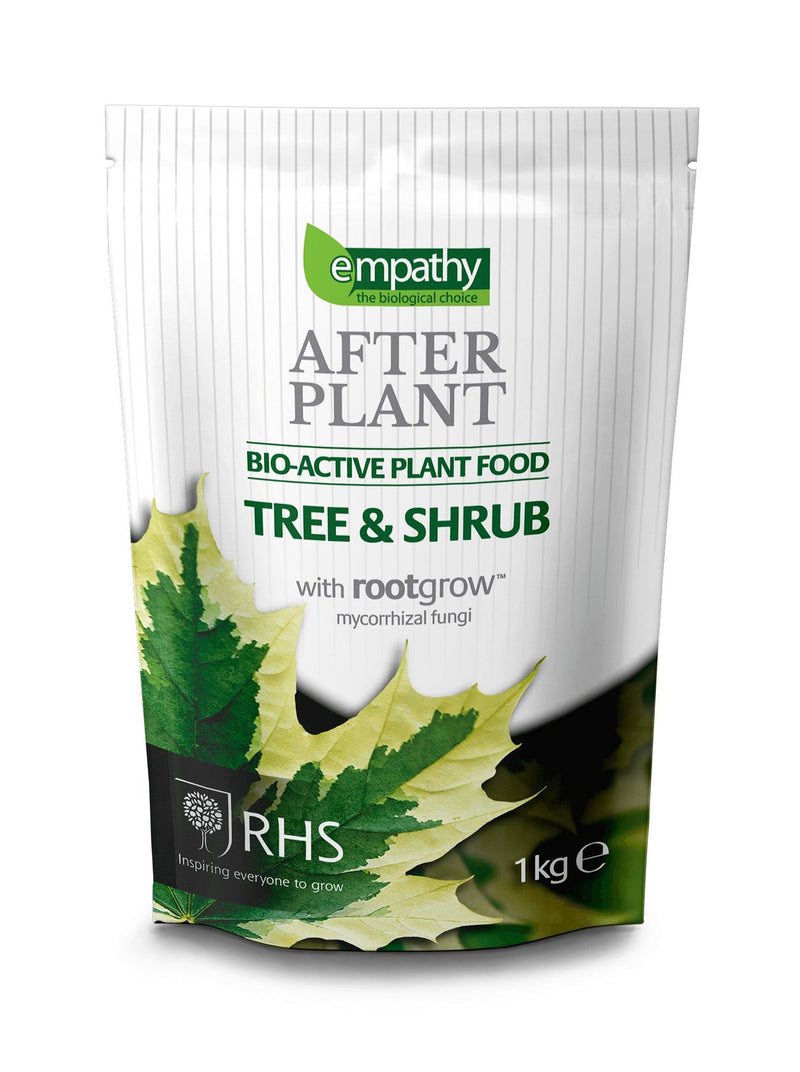 A package of Empathy After Plant bio-active plant food for trees and shrubs with Rootgrow mycorrhizal fungi. The 1 KG pouch is green and white with product information and branding.